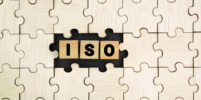 wooden-puzzle-with-the-letter-iso-the-concept-of-2026-03-19-22-03-45-utc